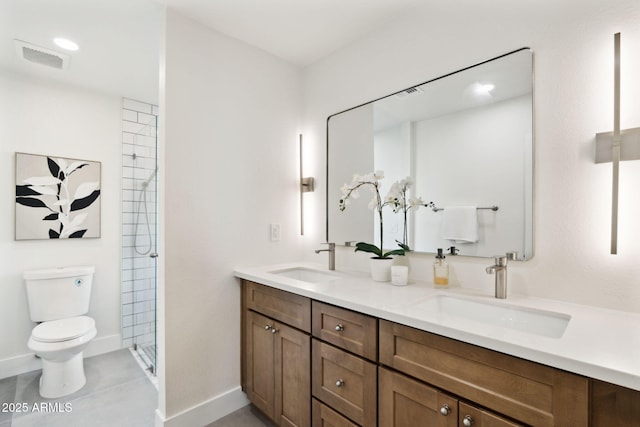 6761 E Juniper Ave, Scottsdale, AZ 85254 - bathroom featuring a sink, visible vents, toilet, and double vanity