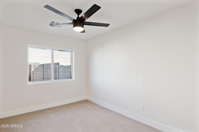 6761 E Juniper Ave, Scottsdale, AZ 85254 - spare room with light carpet, ceiling fan, and baseboards