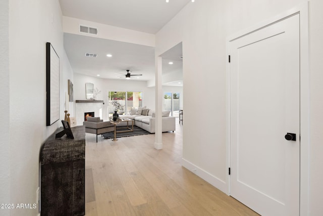 6761 E Juniper Ave, Scottsdale, AZ 85254 - hall with light wood-style flooring, baseboards, visible vents, and recessed lighting