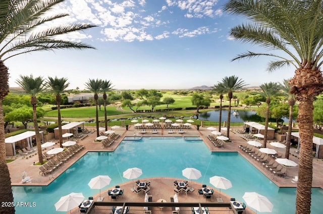 6761 E Juniper Ave, Scottsdale, AZ 85254 - pool with a patio area, outdoor dining area, view of golf course, and a water view