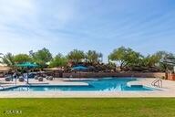 3467 S Falcon Dr, Gilbert, AZ 85297 - view of swimming pool with a yard