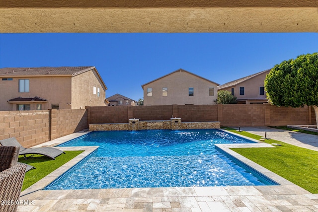 view of swimming pool with pool water feature