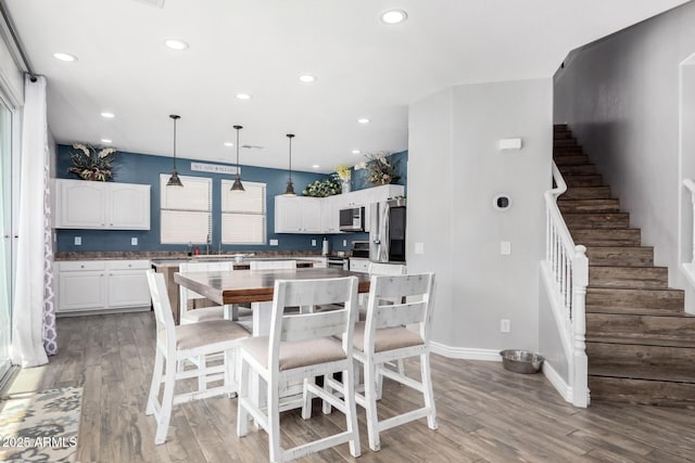 dining room featuring hardwood / wood-style floors