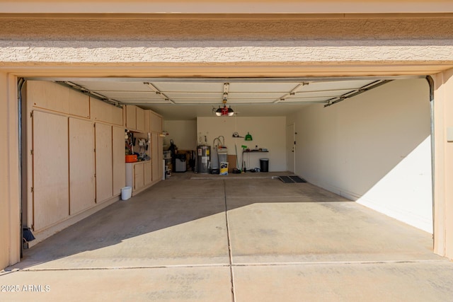 garage featuring a garage door opener and water heater