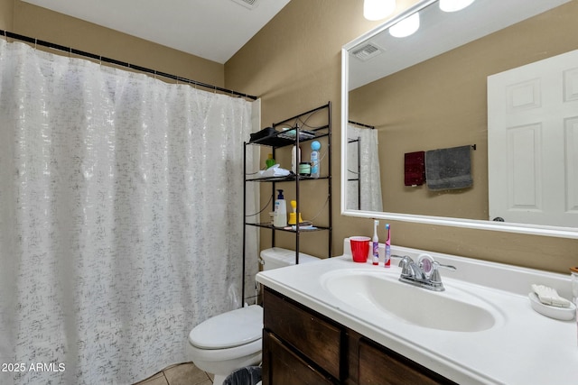 bathroom featuring vanity, curtained shower, tile patterned floors, and toilet