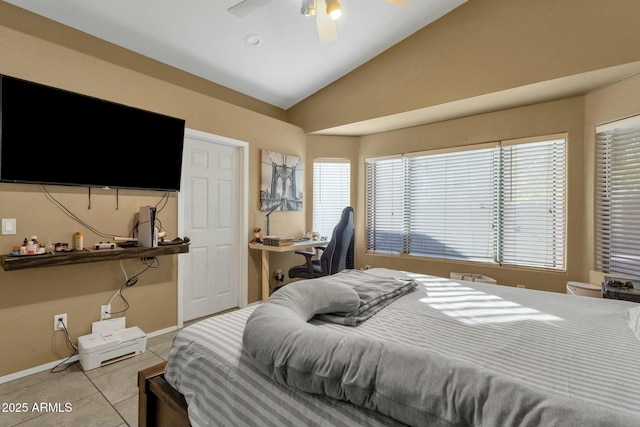 tiled bedroom featuring lofted ceiling and ceiling fan