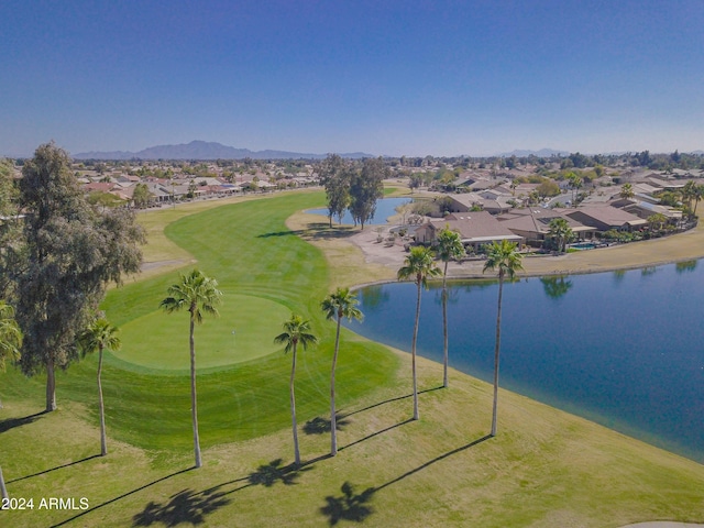 birds eye view of property featuring a water and mountain view