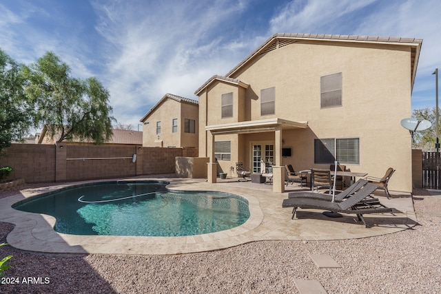 view of swimming pool featuring a patio area