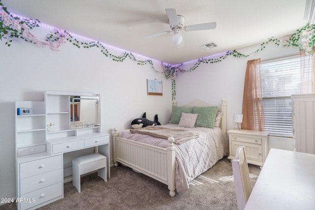 carpeted bedroom with ceiling fan