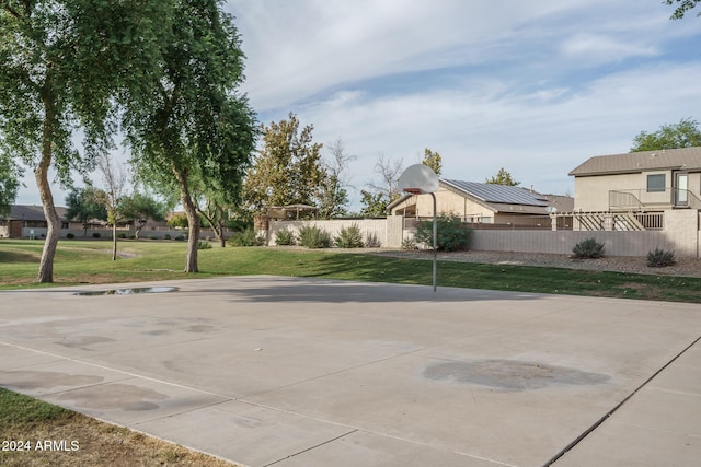 view of patio with basketball hoop