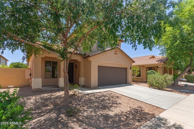 4051 E Torrey Pines Ln E, Chandler, AZ 85249 - mediterranean / spanish-style home featuring a tiled roof, stucco siding, an attached garage, and driveway