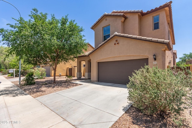 4051 E Torrey Pines Ln E, Chandler, AZ 85249 - mediterranean / spanish-style home featuring a tiled roof, stucco siding, and concrete driveway