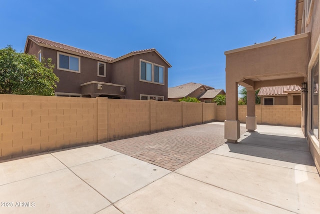 4051 E Torrey Pines Ln E, Chandler, AZ 85249 - fenced backyard with a patio area