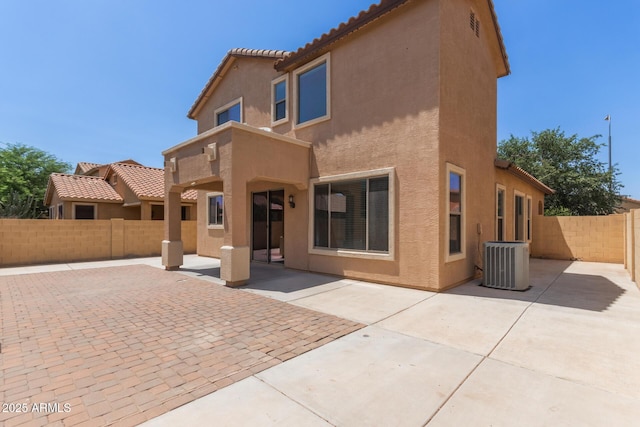 4051 E Torrey Pines Ln E, Chandler, AZ 85249 - back of house with a patio area, stucco siding, a fenced backyard, and a tiled roof