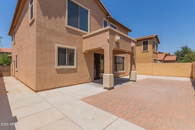 4051 E Torrey Pines Ln E, Chandler, AZ 85249 - back of house with stucco siding, a patio, and a fenced backyard