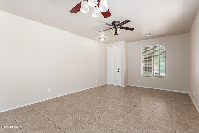 4051 E Torrey Pines Ln E, Chandler, AZ 85249 - empty room featuring light tile patterned floors and ceiling fan