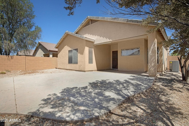 2861 E Morenci Rd, San Tan Valley, AZ 85143 - back of house with stucco siding and a patio