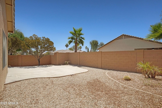 2861 E Morenci Rd, San Tan Valley, AZ 85143 - fenced backyard with a patio area
