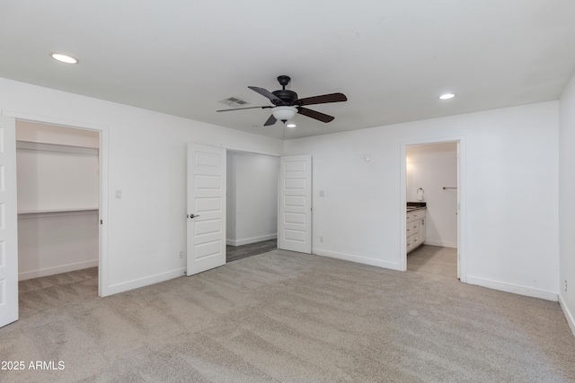 1820 W Seldon Way, Phoenix, AZ 85021 - unfurnished bedroom featuring recessed lighting, light carpet, baseboards, and a spacious closet