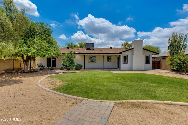 1820 W Seldon Way, Phoenix, AZ 85021 - back of property featuring a patio area and a chimney