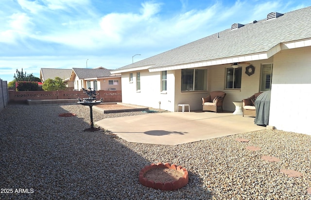 rear view of property with a patio area