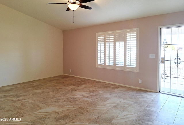 spare room featuring ceiling fan