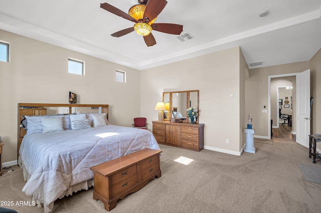 3125 W Desert Ln, Laveen, AZ 85339 - bedroom with light colored carpet, a ceiling fan, and arched walkways