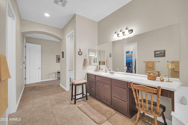 3125 W Desert Ln, Laveen, AZ 85339 - bathroom with double vanity, recessed lighting, and tile patterned floors