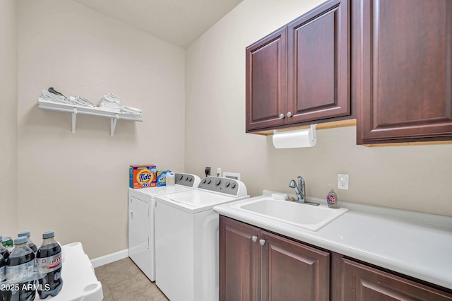 3125 W Desert Ln, Laveen, AZ 85339 - laundry room with cabinet space, separate washer and dryer, and light tile patterned floors