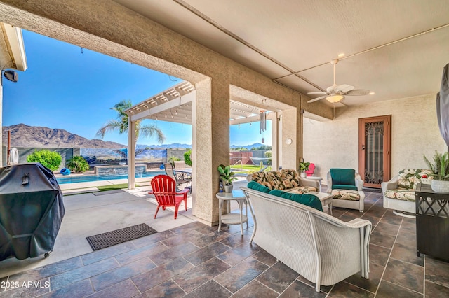 3125 W Desert Ln, Laveen, AZ 85339 - view of patio featuring an outdoor hangout area, a mountain view, ceiling fan, an outdoor pool, and area for grilling