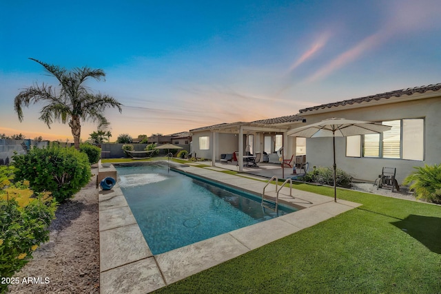3125 W Desert Ln, Laveen, AZ 85339 - pool at dusk featuring a pergola and a patio area