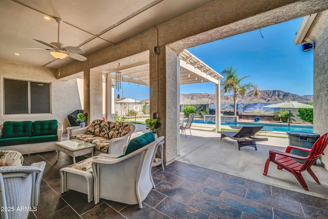 3125 W Desert Ln, Laveen, AZ 85339 - view of patio featuring a mountain view, a ceiling fan, and outdoor lounge area