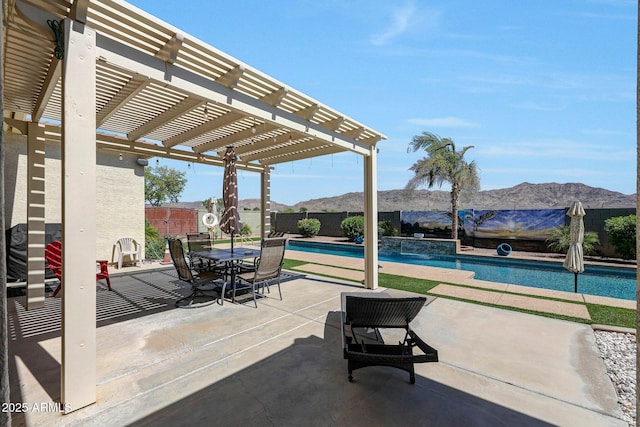 3125 W Desert Ln, Laveen, AZ 85339 - fenced backyard featuring a pergola, a mountain view, and a patio area