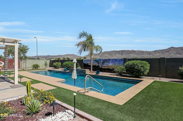 3125 W Desert Ln, Laveen, AZ 85339 - view of swimming pool with a fenced backyard, a mountain view, and a patio