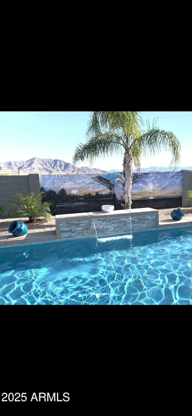 3125 W Desert Ln, Laveen, AZ 85339 - outdoor pool with a mountain view and a hot tub