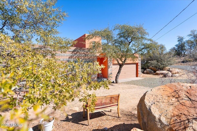 view of yard featuring a garage