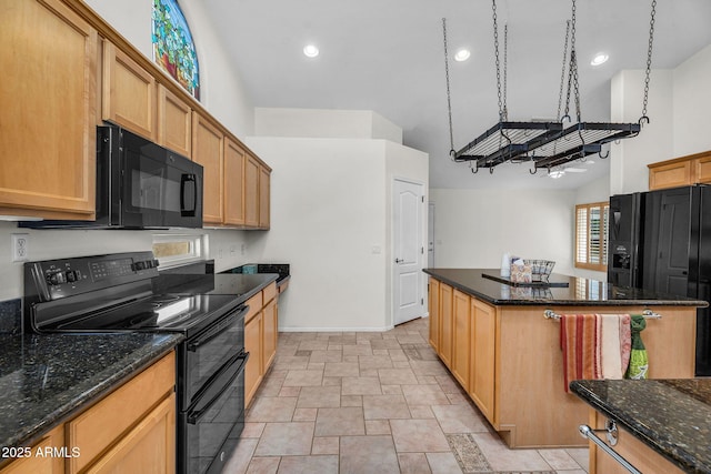 5529 E Holmes Ave, Mesa, AZ 85206 - kitchen featuring black appliances, light stone finish flooring, a center island, recessed lighting, and a high ceiling