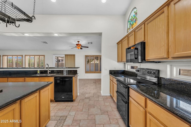 5529 E Holmes Ave, Mesa, AZ 85206 - kitchen featuring black appliances, stone finish flooring, a ceiling fan, dark stone countertops, and recessed lighting
