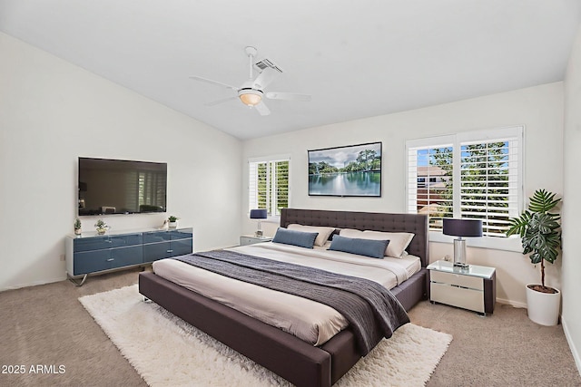 5529 E Holmes Ave, Mesa, AZ 85206 - bedroom with light carpet, lofted ceiling, and a ceiling fan