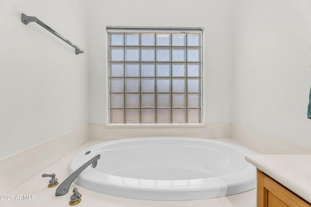 5529 E Holmes Ave, Mesa, AZ 85206 - full bathroom featuring a garden tub, vanity, and plenty of natural light
