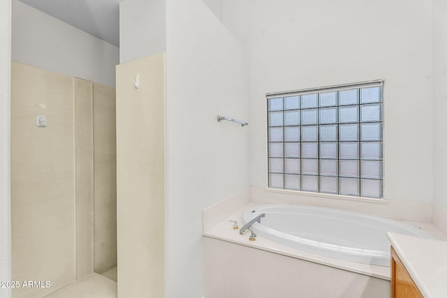 5529 E Holmes Ave, Mesa, AZ 85206 - full bathroom featuring a garden tub, vanity, and walk in shower