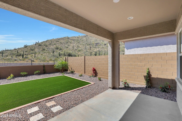 view of patio with a mountain view