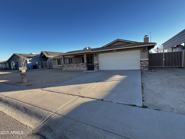 ranch-style house featuring a garage