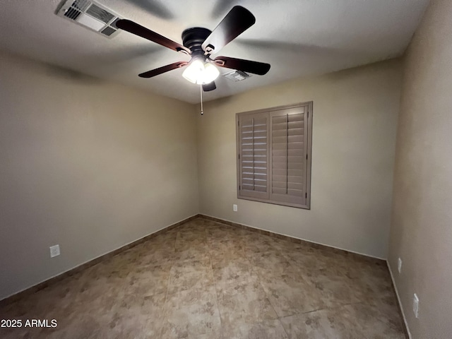 empty room featuring ceiling fan