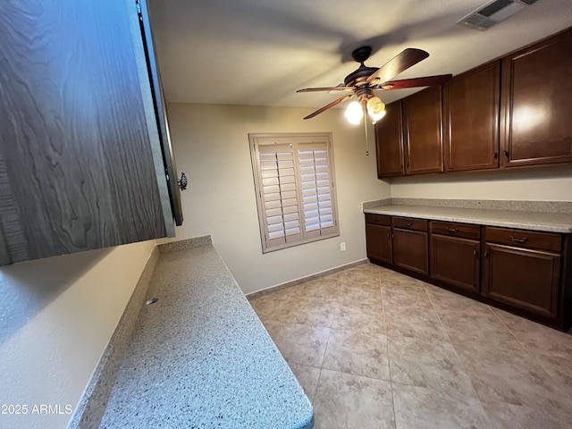 washroom with ceiling fan