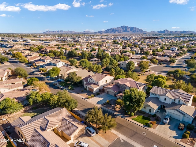 birds eye view of property with a mountain view