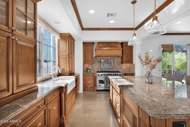 dining room with a chandelier, french doors, and ornamental molding