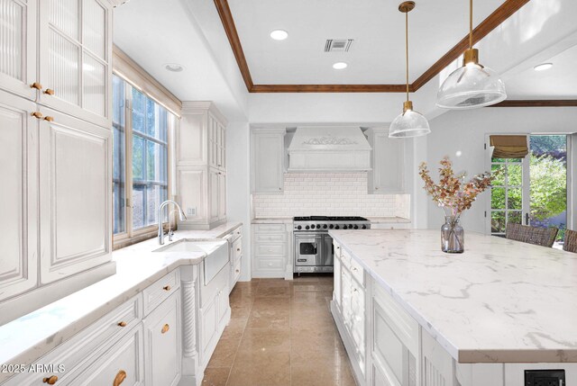 living room featuring french doors, ceiling fan, and crown molding