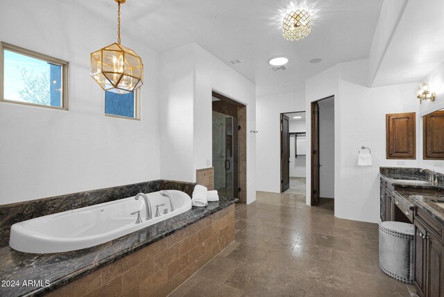 bathroom featuring vanity, toilet, and a shower with door