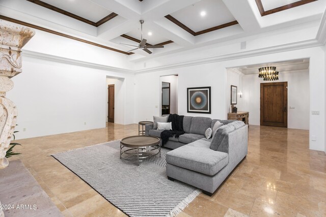 dining area with dark hardwood / wood-style floors, an inviting chandelier, and ornamental molding